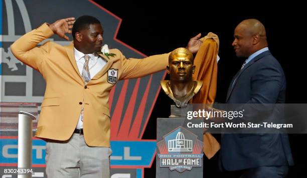 Former TCU Horned Frog and now NFL Hall of Fame member LaDainian Tomlinson unveils his HOF bust with Lorenzo Neal . The 2017 NFL Hall of Fame class,...