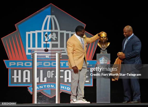 Former TCU Horned Frog and now NFL Hall of Fame member LaDainian Tomlinson unveils his HOF bust with Lorenzo Neal . The 2017 NFL Hall of Fame class,...