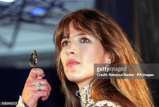 New Bond girl Sophie Marceau holds the De Beers Millennium Star, at its unveiling in London. The 203.4 carat jewel according to diamond merchants De...