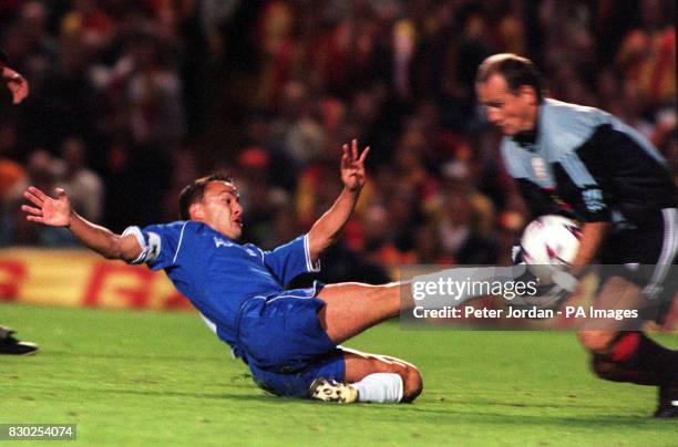 This picture can only be used within the context of an editorial feature. Galatasaray goaleeper Claudio Taffarel scoops the ball from the foot of...