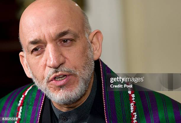 Afghan President Hamid Karzai participates in a Video Teleconference with United States Provincial Reconstruction Team Leaders, National Guard...