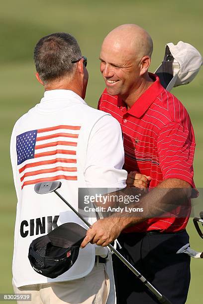 Stewart Cink of the USA team hugs his caddie during the singles matches on the final day of the 2008 Ryder Cup at Valhalla Golf Club on September 21,...