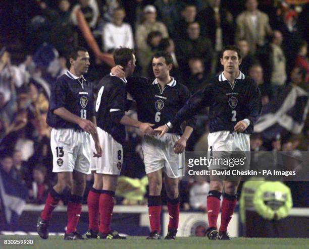 Scotland`s Colin Calderwood, Craig Burley, Christian Dailly and David Weir celebrate their win against Bosnia Herzegovina during their UEFA European...