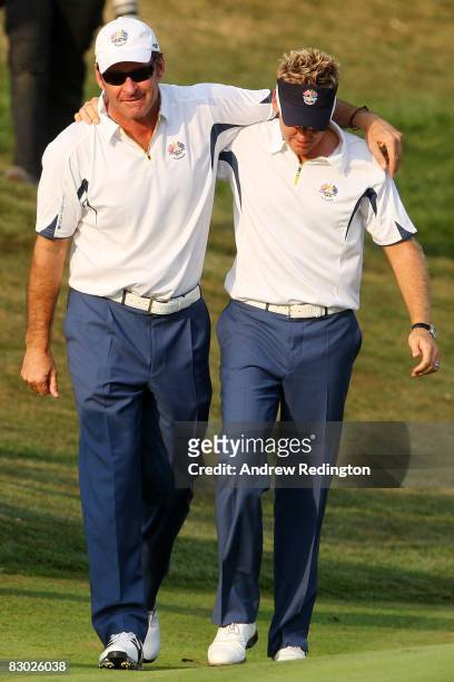 Captain Nick Faldo and Ian Poulter of the European team walk together during the singles matches on the final day of the 2008 Ryder Cup at Valhalla...