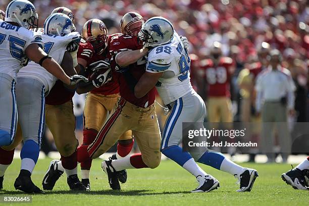 Billy Bajema of the San Francisco 49ers blocks Dewayne White of the Detroit Lions during the game on September 21, 2008 at Candlestick Park in San...