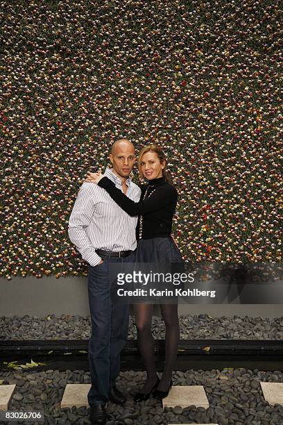 Realtor Keith Rubenstein poses at a portrait session with his wife Inga Rubenstein at their home in New York City.