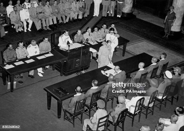 Lord Louis Mountbatten, Commander of the Allied forces in South East Asia, presides as General Itagaki of the Japanese Imperial Army signs the...