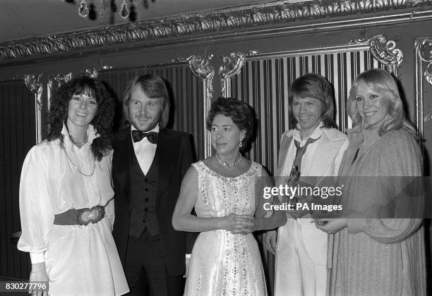 Princess Margaret with four members of the Swedish pop group "Abba" afther she had presented them with the Carl-Alan group Award for 1977 at the...