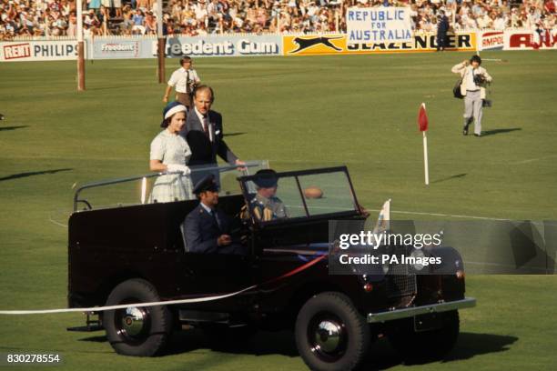 Queen Elizabeth II and the Duke of Edinburgh are driven around in a field car when they attended a Rugby League match at Sydney Cricket Ground....