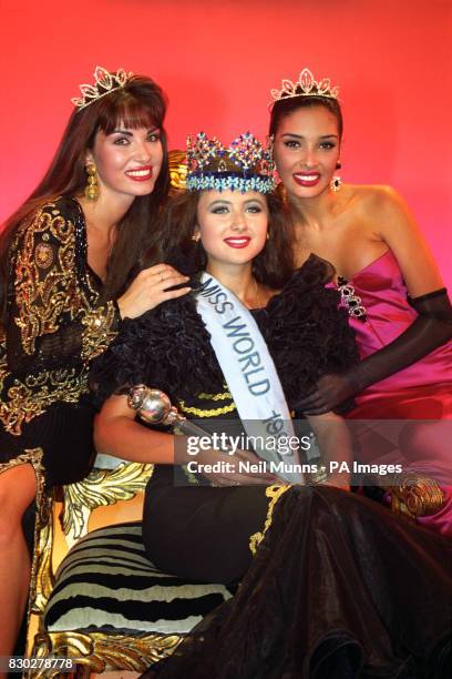 The new Miss World Julia Kurochkina from Russia is flanked by Miss UK, Claire Smith who was second & runner up Miss Venezuela, Francis Gago, in Sun...
