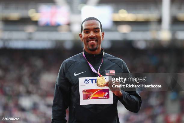 Christian Taylor of the United States, gold, poses with his medal for the Men's Triple Jump during day eight of the 16th IAAF World Athletics...