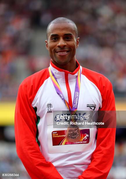 Nelson Evora of Portugal, bronze, poses with his medal for the Men's Triple Jump during day eight of the 16th IAAF World Athletics Championships...