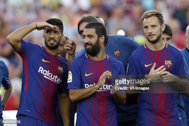 Luis Suarez of FC Barcelona, Arda Turan of FC Barcelona, Ivan Rakitic of FC Barcelona during the Trofeu Joan Gamper match between FC Barcelona and...