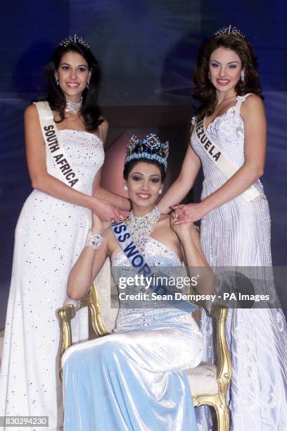 Yukta Mookhey, Miss India, crowned Miss World, on stage after her win at Olympia in London, flanked by 3rd place Miss South Africa, Sonia Raciti and...