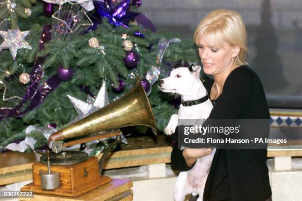 Jack Russell terrier Meg with her owner Lisa Davies, after the dog was chosen as the new mascot for the HMV chain on ITV's This Morning. The music...