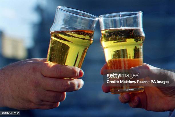London's skyline as seen through two glasses of Bulmers cider, at a photocall in London, for the announcement of their Interim results. : Growing...