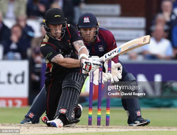 Luke Ronchi of Leicesteshire sweeps the ball away for four runs during the NatWest T20 Blast match between the Northamptonshire Steelbacks and...