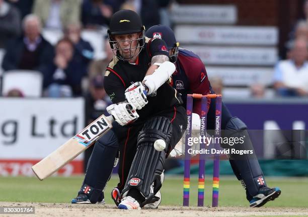 Luke Ronchi of Leicesteshire sweeps the ball away for four runs during the NatWest T20 Blast match between the Northamptonshire Steelbacks and...