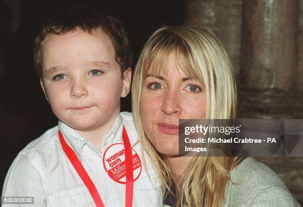 Martin Perry age 5 from Scotland with model Heather Mills, during the award ceremony held at Westminster Abbey, for the Woman's Own Millennium...