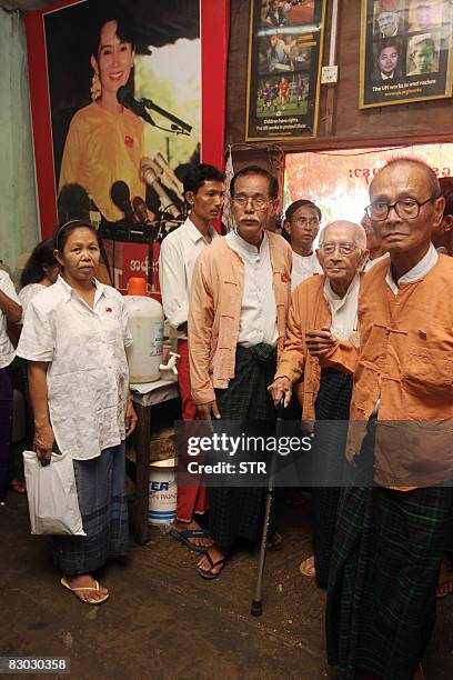 An elderly leader of National League for Democracy Party arrives at its headquarters to attend a ceremony to mark the 20th founding anniversary of...