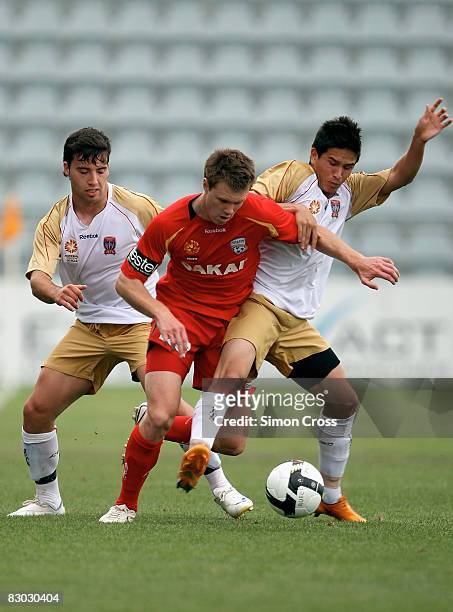 Daniel Mullen of United controls the ball during the round one National Youth League match between Adelaide United and the Newcastle Jets at...
