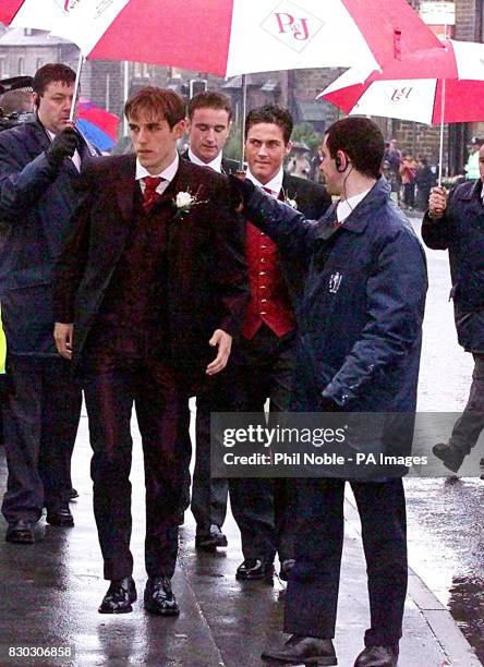 This picture can only be used within the context of an editorial feature. Manchester United star Phil Neville arrives at St James The Less Roman...