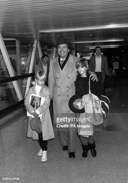Robert Wagner with his daughters Courtney and Natasha at Heathrow Airport in London before flying to Switzerland.