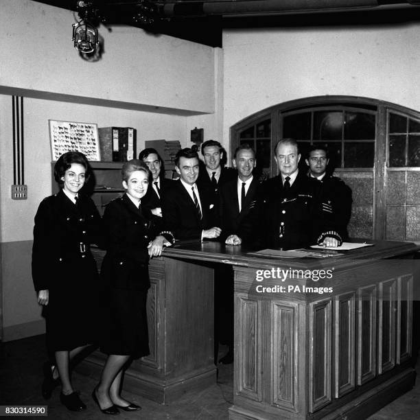 The cast of the BBC series "Dixon of Dock Green," Jean Dallas, Anne Carroll, Joe Dunlop, Peter Byrne, Nicholas Donnelly, Geoffery Adams, Jack Warner...