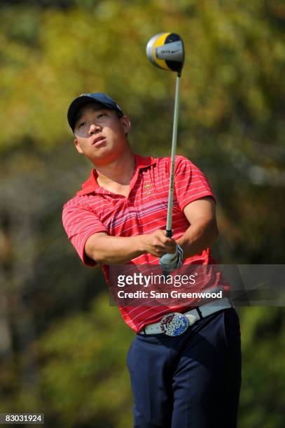 Anthony Kim of the USA team watches his shot during the singles matches on the final day of the 2008 Ryder Cup at Valhalla Golf Club on September 21,...