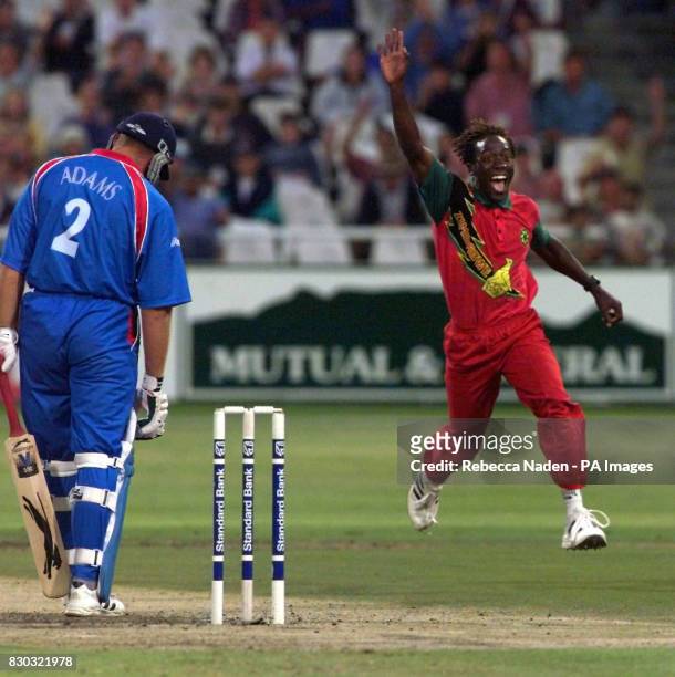 Zimbabwe's Henry Olonga celebrates the wicket of England's Chris Adams, during their One Day International at the Newlands Cricket ground, Cape Town,...