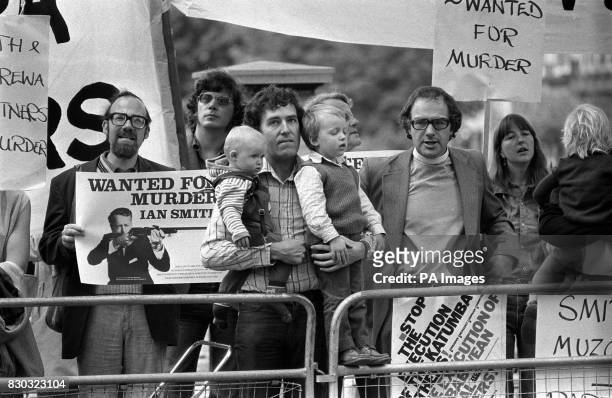 Anti-Apartheid campaigner Peter Hain with his sons Sam and Jake join the demonstrators awaiting the arrival of Ian Smith at his London hotel. * :...