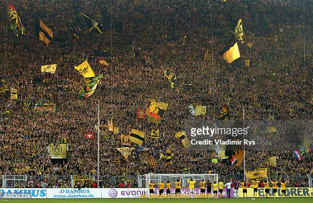 Team Dortmund acknowledge it's fans after winning 3:0 the Bundesliga match between Borussia Dortmund and VfB Stuttgart at the Signal Iduna Park on...