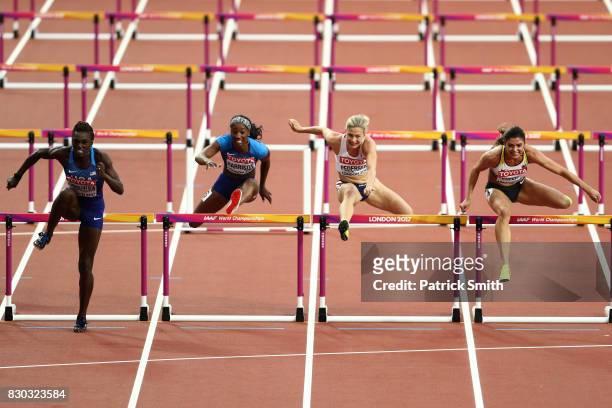 Dawn Harper Nelson of the United States, Pamela Dutkiewicz of Germany and Kendra Harrison of the United States compete in the Women's 100 metres...