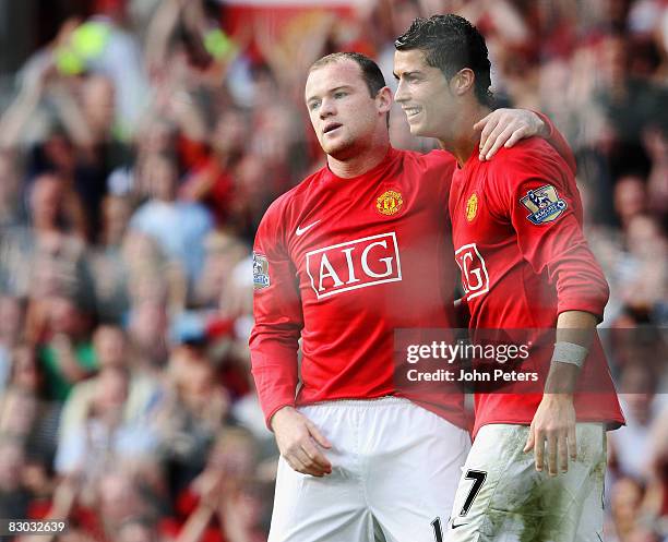 Wayne Rooney of Manchester United celebrates scoring their second goal during the FA Premier League match between Manchester United and Bolton...