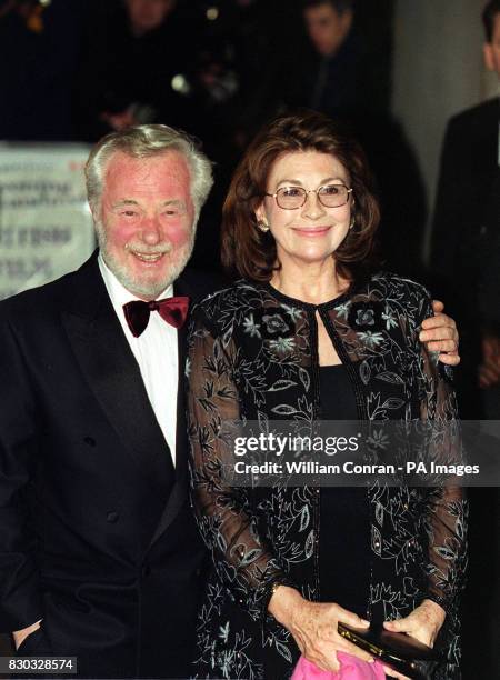 Nanette Newman and her husband film director Brian Forbes arriving at the Evening Standard British Film Awards, held at the Savoy hotel in London.