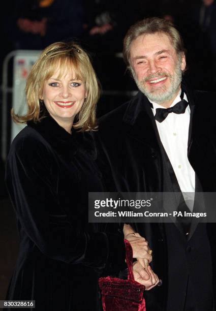 Twiggy and her husband Leigh Lawson arriving at the Evening Standard British Film Awards, held at the Savoy hotel in London.