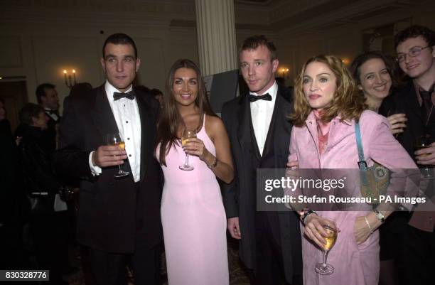Former footballer and actor Vinnie Jones with his wife Tanya and American singer Madonna with her boyfriend British film director Guy Ritchie at the...