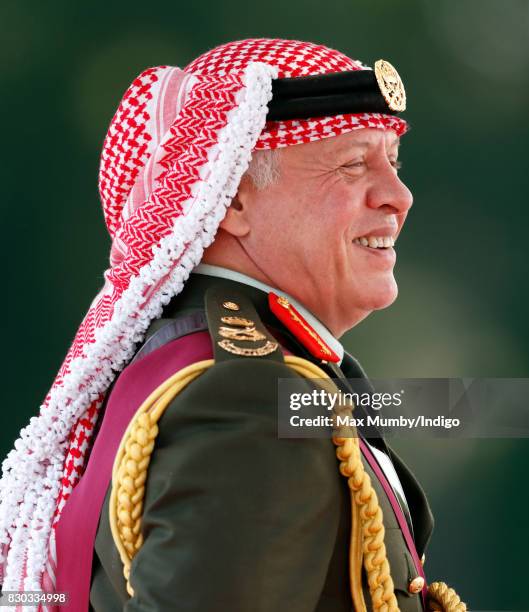 King Abdullah II of Jordan represents Queen Elizabeth II as he attends the Sovereign's Parade at the Royal Military Academy Sandhurst on August 11,...