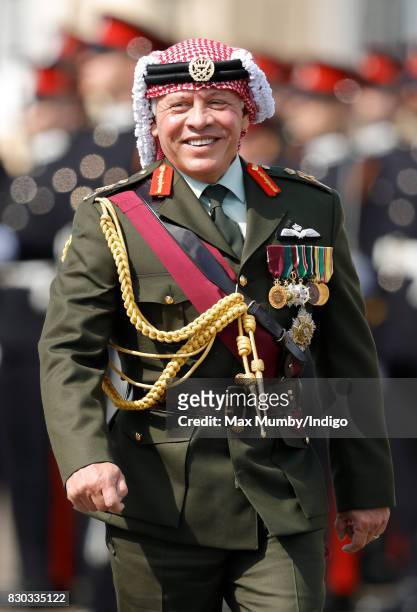 King Abdullah II of Jordan inspects the Officer Cadets as he represents Queen Elizabeth II during the Sovereign's Parade at the Royal Military...