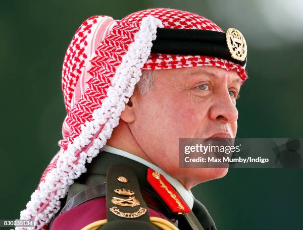 King Abdullah II of Jordan represents Queen Elizabeth II as he attends the Sovereign's Parade at the Royal Military Academy Sandhurst on August 11,...