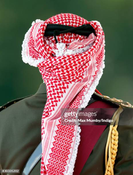 King Abdullah II of Jordan represents Queen Elizabeth II as he attends the Sovereign's Parade at the Royal Military Academy Sandhurst on August 11,...