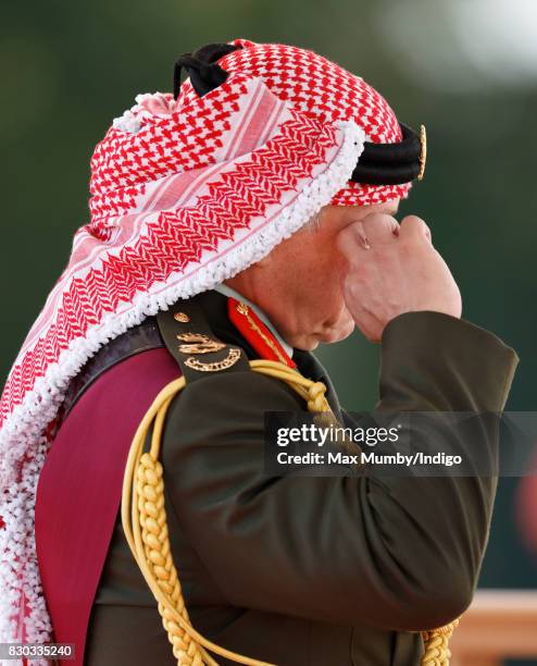 King Abdullah II of Jordan represents Queen Elizabeth II as he attends the Sovereign's Parade at the Royal Military Academy Sandhurst on August 11,...