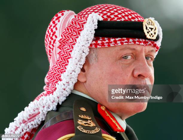 King Abdullah II of Jordan represents Queen Elizabeth II as he attends the Sovereign's Parade at the Royal Military Academy Sandhurst on August 11,...