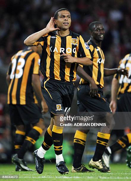 Hull City's Brazilian player Geovanni gestures to supporters after scoring the opening goal against Arsenal during Premiership match at The Emirates...