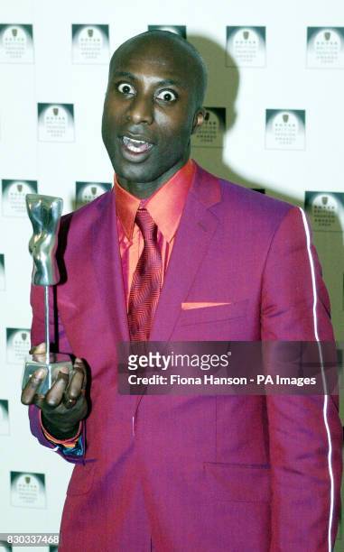 Ozwald Boateng with his award for British Menswear Designer of The Year, at the Rover British Fashion Awards 2000 in London.