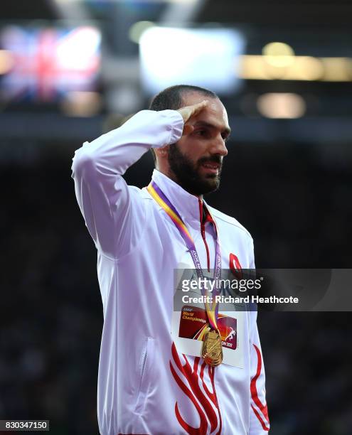 Ramil Guliyev of Turkey, gold, poses with his medal for the Men's 200 metres during day eight of the 16th IAAF World Athletics Championships London...