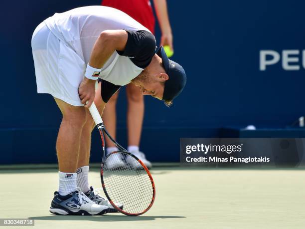 Diego Schwartzman of Argentina reacts after losing a point against Robin Haase of Netherlands during day eight of the Rogers Cup presented by...