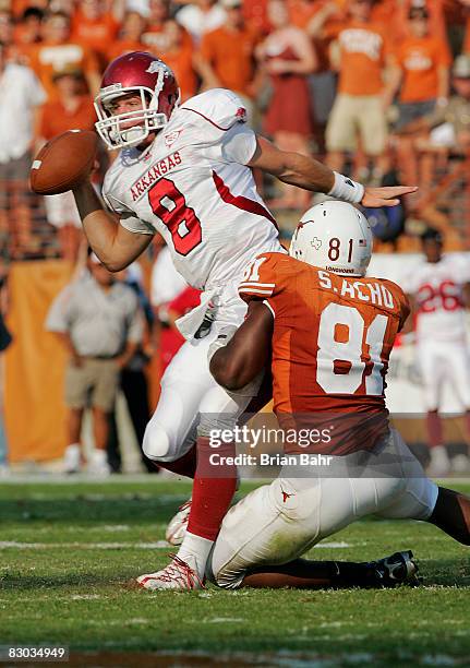 Defensive end Sam Acho of the Texas Longhorns sacks quarterback Tyler Wilson of the Arkansas Razorbacks on September 27, 2008 at Darrell K...