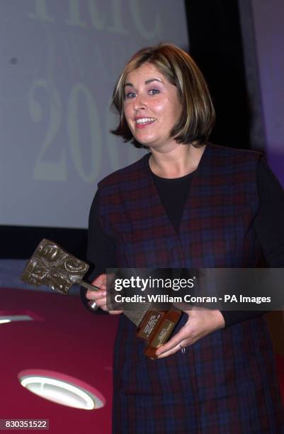 Liza Tarbuck receives her Satellite/Digital TV Personality of the Year award at the Television and Radio Industries Club Awards in London.