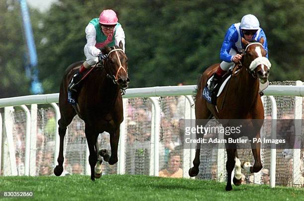 Mythical Girl ridden by Frankie Dettori en route to victory in the Princess Margaret Stakes from Rustic ridden by Michael Kinane at Ascot this...